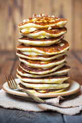 High stack of pancakes.