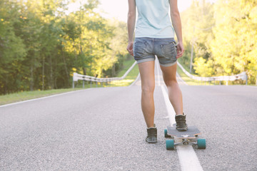 Girl with longboard.