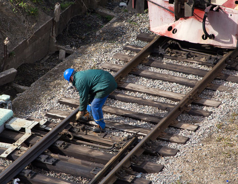 Railway worker in action