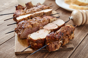 Skewered meat or shish kebabs of pork in marinade