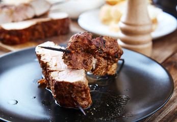 Skewered meat or shish kebabs of pork in marinade