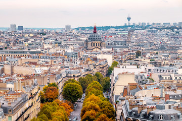 Aerial view of Paris, France. Sunset, buildings and warm light. Shot in october daylight.