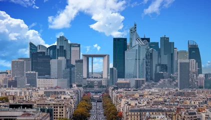Foto op Canvas La Defense Financial District Paris France in autumn. Traffic on Champs-Elysees with orange and yellow trees aside. Modern vs. Old architecture. Blue sky with clouds. © Augustin Lazaroiu