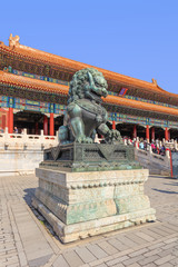 Guardian Lion in front of pavilion at Palace Museum, Beijing, China