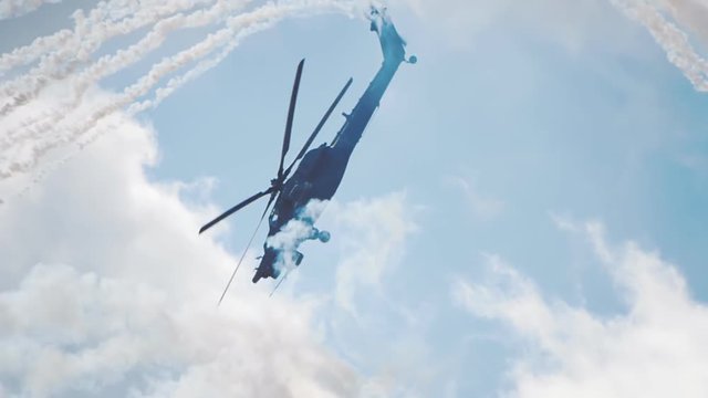 Attack helicopter "Night Hunter" Mi-28 helicopter launched anti-missile flares. Includes audio. Contains audio