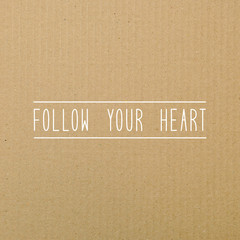Follow your heart on brown paper.