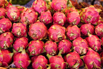 Dragon fruit on market stand, Thailand.