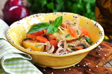 Vegetable stew with potatoes, cabbage, carrots, mushrooms and onions.