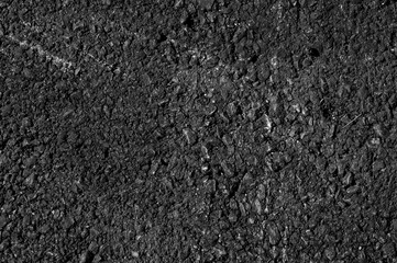 Close up of asphalt road,Black nature asphalt background,background texture of rough asphalt,macadamized texture