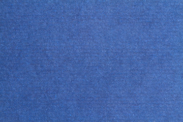 Blue paper texture, dark background