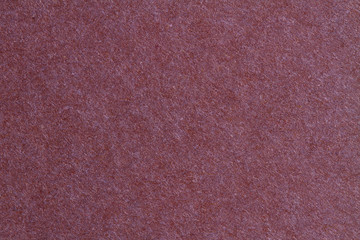 Red paper texture, dark background