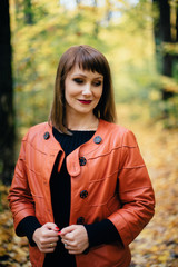 girl in autumn deciduous forest