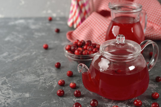 Cranberry tea in a glass teapot