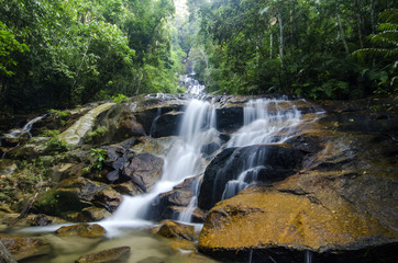 beautiful in nature, amazing cascading tropical waterfall. wet a
