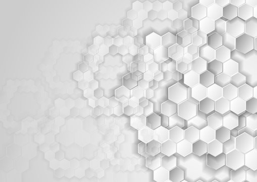 Light grey tech background with hexagons © saicle
