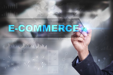 Fototapeta na wymiar Business is drawing on virtual screen. e-commerce concept.