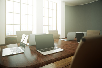 Conference table with laptop