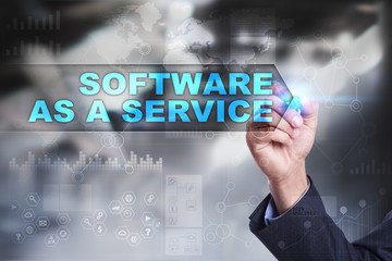 Business is drawing on virtual screen. software as a service concept.