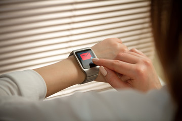 Smart watch on a female hand. Back view