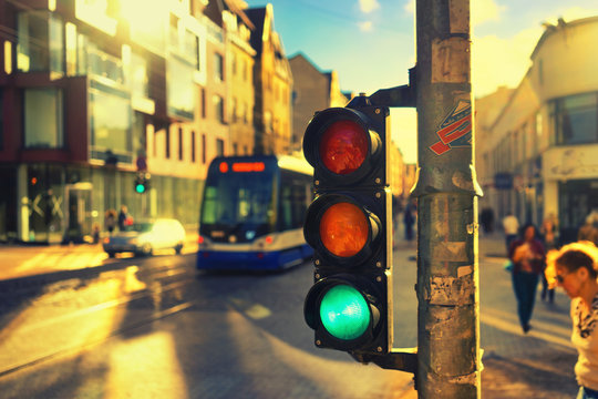 Traffic lights at the crossroads in the sunlight