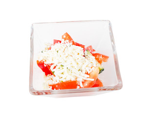 Tomato salad with feta cheese and cucumbers.