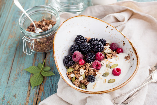 Delicious granola with blackberry, close-up