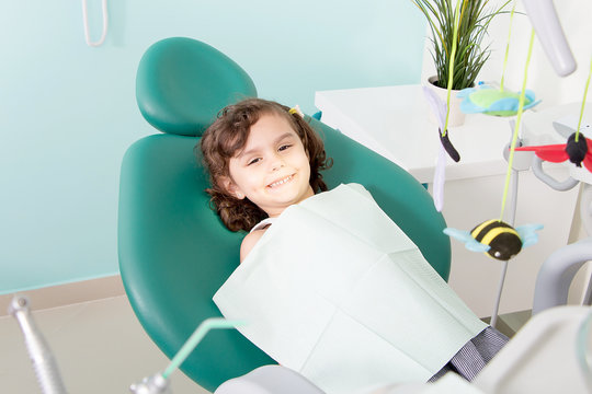 Little girl smiling at dental clinic