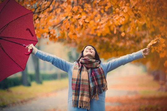 brunette girl with umbrella