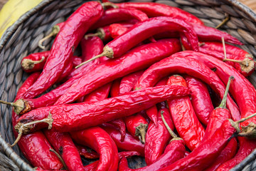 Red hot chili peppers on a wicker basket