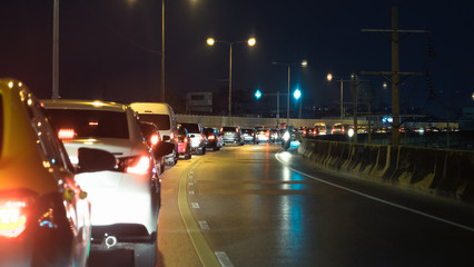 Traffic jams on the road at night in bangkok