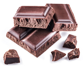 Pieces of chocolate bar isolated on a white background.