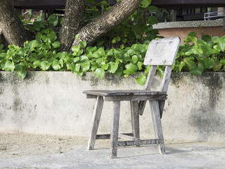 Landscape decoration - original wooden chair in the garden