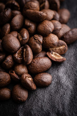 roasted coffee beans on dark background, can be used as a background