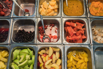 Various fresh fruit and vegetable salad bar healthy items