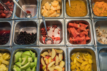 Various fresh fruit and vegetable salad bar healthy items