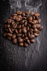 roasted coffee beans on dark background, can be used as a background