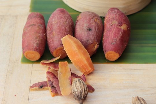 sweet potato boiled is delicious on wood background.