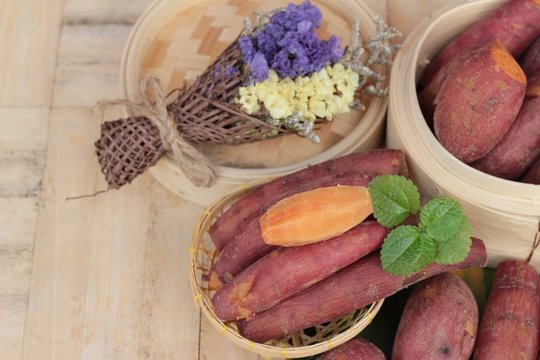 sweet potato boiled is delicious on wood background.