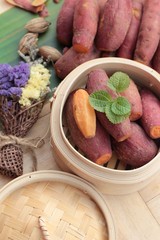 sweet potato boiled is delicious on wood background.