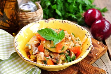 Vegetable stew with potatoes, cabbage, carrots, mushrooms and onions.