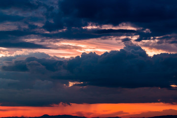 colorful dramatic sky with cloud at sunset