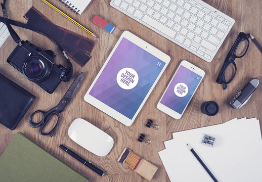 Tablet and Smartphone Close Up on Wooden Desk with Camera and Drawing Paper Mockup 2