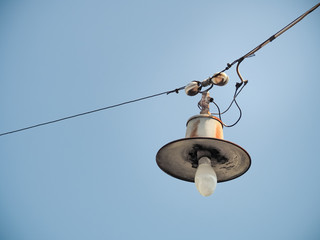 Color filter image/ Old bulb hanging on the sky, Selective focus 