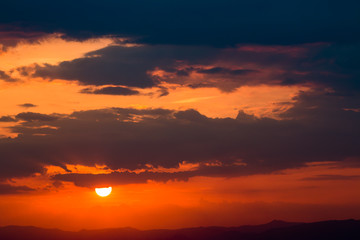 colorful dramatic sky with cloud at sunset