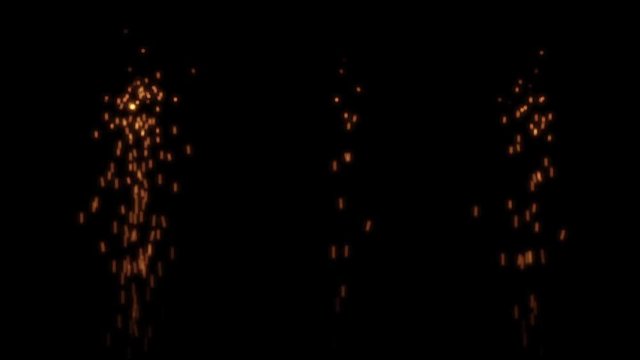 Welding Particles Falling on a Black Background