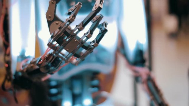 Metal robot arm moves up and stirs the fingers. Many color correction options 