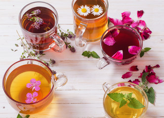 herbal tea on a white wooden background