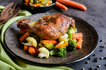 Roasted chicken leg with steamed vegetable