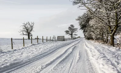 Wall murals Winter Snowy country lane in Cumbria