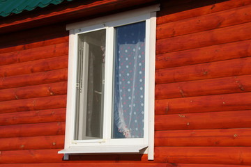 Plastic window of a modern summer cottage